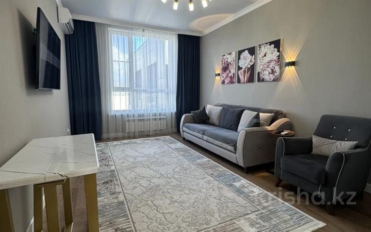 2-комнатная квартира · 64 м² · 10/10 этаж, Бокейхана 25 за 46 млн ₸ в Астане, Есильский р-н — фото 2