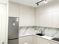 2-комнатная квартира · 69.4 м² · 4/9 этаж, Толе Би 35/1 за ~ 49.5 млн ₸ в Астане, Нура р-н — фото 2