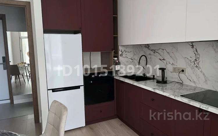 2-комнатная квартира · 58 м² · 3/9 этаж, Сыганак 12 за 350 000 ₸ в Астане, Нура р-н — фото 2