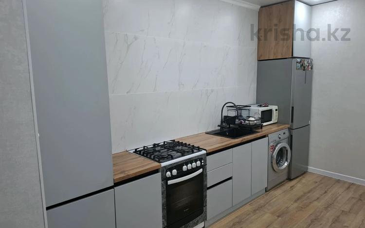 1-комнатная квартира · 54 м² · 4/5 этаж, мкр. Алтын орда, Х.Досмухамед Улы за 150 000 ₸ в Актобе — фото 2