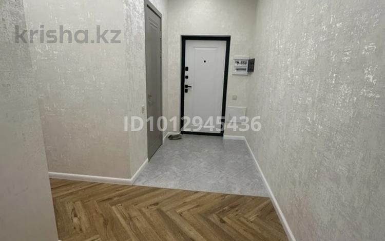 2-комнатная квартира · 70 м² · 8/20 этаж, Жургенова за 52 млн ₸ в Астане, Сарайшык р-н — фото 2