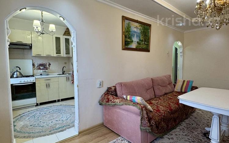3-комнатная квартира · 64 м² · 5/5 этаж, мкр Аксай-2 5 за 35.5 млн ₸ в Алматы, Ауэзовский р-н — фото 3