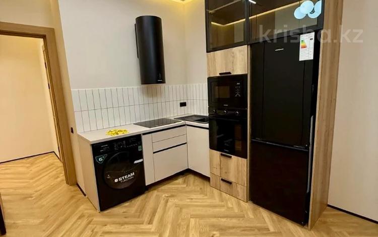 2-комнатная квартира · 42 м² · 9 этаж, Толе Би 290/1 за 39 млн ₸ в Алматы, Алмалинский р-н — фото 5