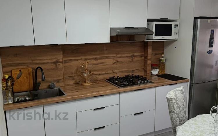 2-комнатная квартира · 52 м² · 4/5 этаж, мкр Аксай-3Б за 36 млн ₸ в Алматы, Ауэзовский р-н — фото 20