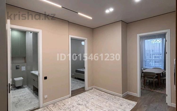 2-комнатная квартира · 66 м² · 18/18 этаж, ул. Е-36 4 за 380 000 ₸ в Астане, Нура р-н — фото 2