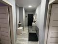 2-комнатная квартира · 60.7 м² · 2/6 этаж, мкр Аксай-4 за 41 млн ₸ в Алматы, Ауэзовский р-н — фото 18