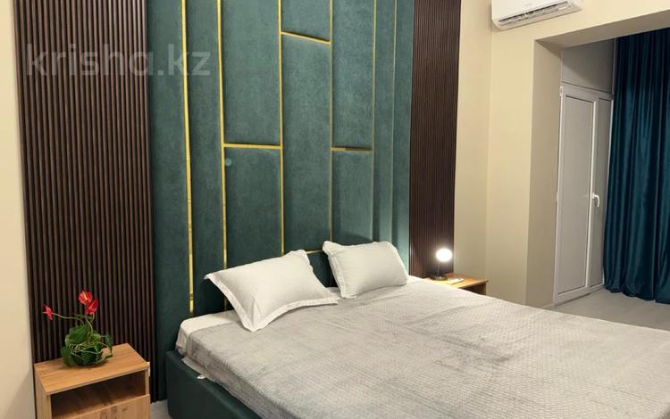 2-комнатная квартира · 50 м² · 9/20 этаж, Гагарина 310 за 18 000 〒 в Алматы, Бостандыкский р-н — фото 16