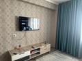 2-комнатная квартира · 46 м² · 10/10 этаж, мкр Аксай-5 25 за 33 млн ₸ в Алматы, Ауэзовский р-н — фото 2