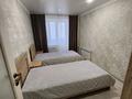3-комнатная квартира · 69 м² · 1/9 этаж, Ауэзова за 25 000 ₸ в Экибастузе — фото 3