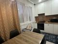 3-комнатная квартира · 64 м² · 5/5 этаж, 10 мкр 11 — 6 школа за 22.2 млн ₸ в Аксае — фото 11