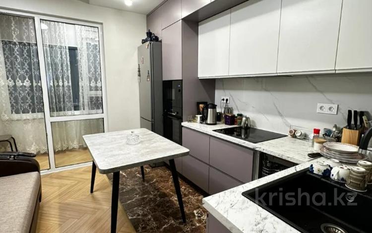 2-комнатная квартира · 70 м² · 12/18 этаж, Розыбакиева 320 за 90 млн ₸ в Алматы, Бостандыкский р-н — фото 2