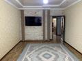 3-комнатная квартира, 92.4 м², 5/5 этаж, Алии Молдагуловой 54е за 27 млн 〒 в Актобе — фото 2