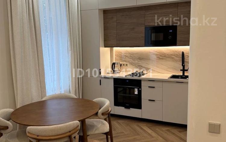 2-бөлмелі пәтер · 52 м² · 2/4 қабат, Желтоксан 144 — Уг ул Кабанбай батыра, бағасы: 83 млн ₸ в Алматы, Алмалинский р-н — фото 2