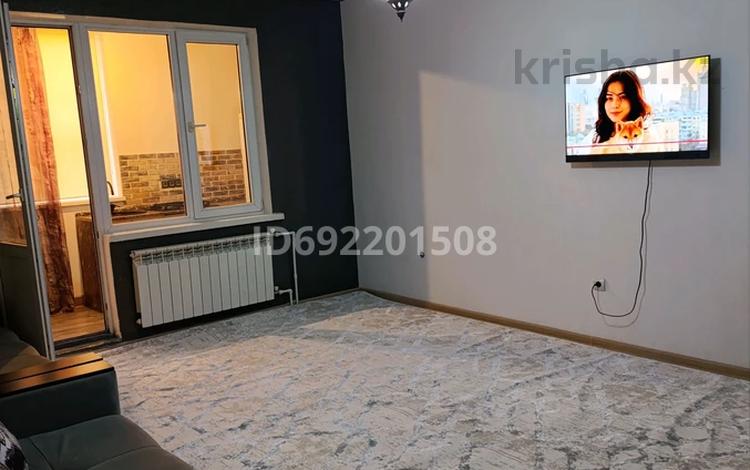 1-комнатная квартира, 52 м², 1/9 этаж, мкр Аксай-1А 22 — Толе би - Момышулы за 35 млн 〒 в Алматы, Ауэзовский р-н — фото 12