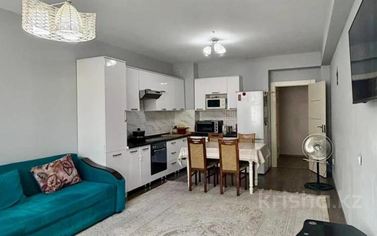 2-комнатная квартира · 64.6 м² · 10/12 этаж, ул. Толе би 273/5 за 46 млн ₸ в Алматы, Алмалинский р-н — фото 30