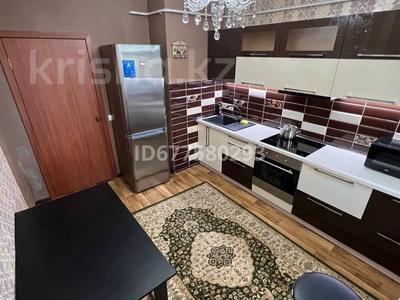 2-комнатная квартира, 74 м², 1 этаж посуточно, Микрорайон каратал 45 в за 12 000 〒 в Талдыкоргане, Каратал