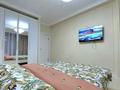 2-комнатная квартира, 49 м², 5/15 этаж посуточно, Жандосова за 22 000 〒 в Алматы, Ауэзовский р-н — фото 3