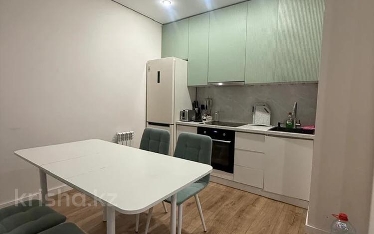 2-комнатная квартира · 56 м² · 8/16 этаж, ул. Ташена Утепова 31блок7 за 46 млн ₸ в Алматы, Бостандыкский р-н — фото 2