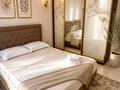 4-комнатная квартира · 128 м² · 9/13 этаж, Розыбакиева 247 за 45 000 ₸ в Алматы, Бостандыкский р-н — фото 3