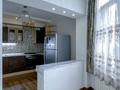 4-комнатная квартира · 112 м² · 1/9 этаж, мкр Хан Тенгри, Кенесары хана 54 за 450 000 〒 в Алматы, Бостандыкский р-н — фото 9
