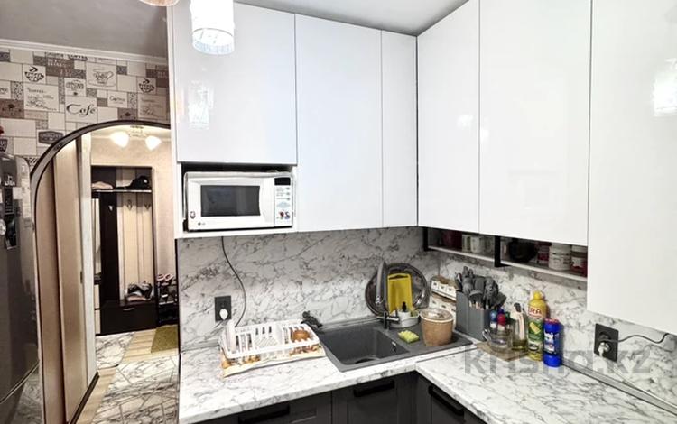 4-комнатная квартира · 74.6 м² · 4/9 этаж, 50 лет Октября 31 за 27 млн 〒 в Рудном — фото 2