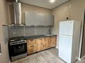 3-комнатная квартира · 70 м² · 1/12 этаж, мкр Аксай-1А — Толе би-Момышулы за 300 000 ₸ в Алматы, Ауэзовский р-н — фото 4