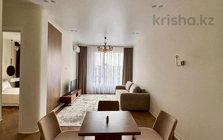 2-комнатная квартира · 58 м² · 16/16 этаж, Розыбакиева 197/2 за 76 млн ₸ в Алматы, Бостандыкский р-н — фото 16