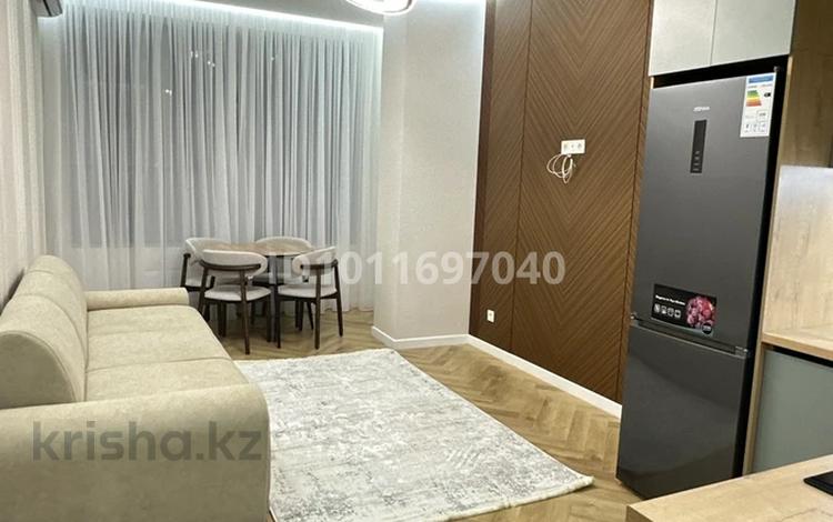 2-комнатная квартира · 48.1 м² · 7/20 этаж, Тургут Озала 237 за 51.9 млн ₸ в Алматы, Бостандыкский р-н — фото 9