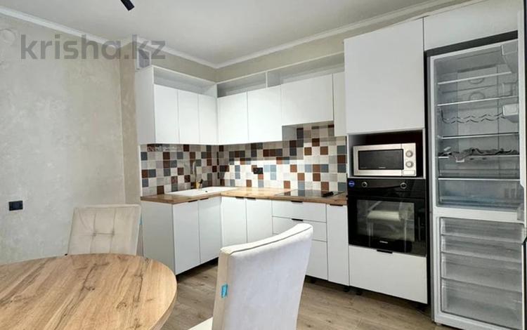 2-комнатная квартира · 70 м² · 3/12 этаж, Тургут Озала 194 за 72 млн ₸ в Алматы, Алмалинский р-н — фото 2