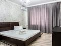 1-комнатная квартира, 50 м², 1/5 этаж посуточно, Сатпаева 48Б за 12 000 〒 в Атырау — фото 2