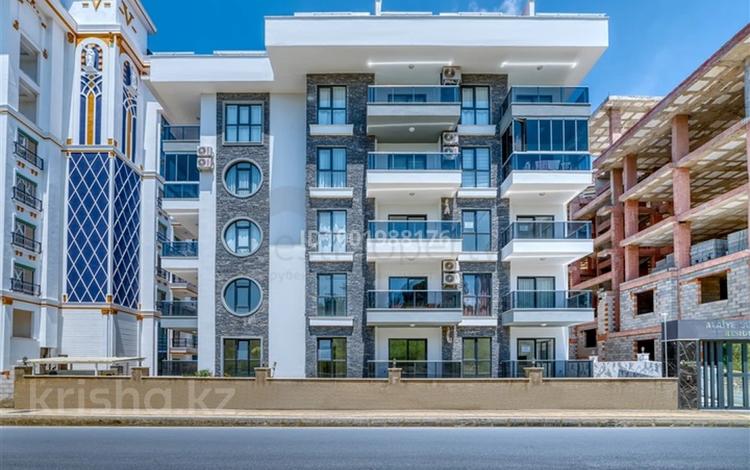 2-комнатная квартира · 55 м² · 1 этаж, Mahmutlar, Kılıçarslan Cd. No:25, 07460 Alanya/Antalya, Турция 1 за 45 млн ₸ в Аланье — фото 2