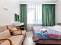 2-комнатная квартира · 65 м² · 4/19 этаж, Туран 57 за 18 000 ₸ в Астане, Есильский р-н — фото 2