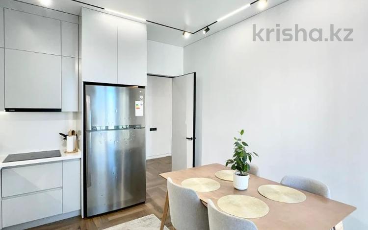 2-комнатная квартира · 72 м² · 4/12 этаж, Тургут Озала 194 за 67 млн ₸ в Алматы, Бостандыкский р-н — фото 2