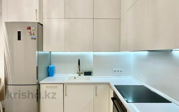 2-комнатная квартира · 52 м² · 5/16 этаж, Торайгырова 19а за 48.5 млн ₸ в Алматы, Бостандыкский р-н — фото 9