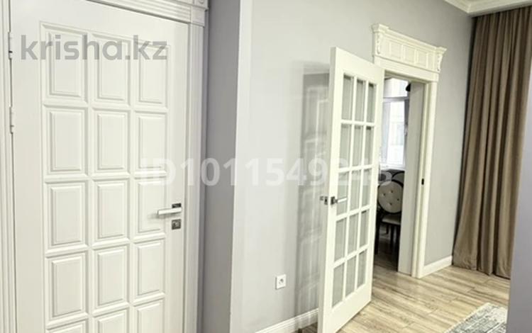 2-комнатная квартира · 60 м² · 6/13 этаж, Ходжанова 57/5 за 71 млн ₸ в Алматы, Бостандыкский р-н — фото 2
