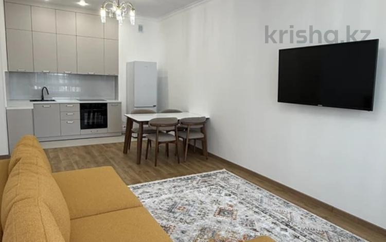 2-комнатная квартира · 56 м² · 4/9 этаж, Каныша Сатпаева 90а/1 за 68.5 млн ₸ в Алматы, Бостандыкский р-н — фото 2