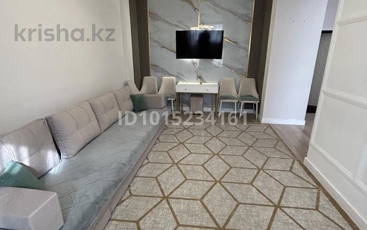 2-комнатная квартира · 60 м² · 9/12 этаж, Толе би 25/1 — Толе би-Улы дала за 380 000 ₸ в Астане, Нура р-н — фото 2