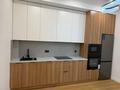 2-комнатная квартира · 56.1 м² · 12/20 этаж, Тургут Озала 237 за 53.5 млн ₸ в Алматы, Бостандыкский р-н — фото 2