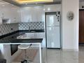 2-комнатная квартира · 52 м² · 10/10 этаж, Махмутлар Аланья 45 за 55 млн 〒 — фото 19