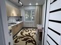 1-комнатная квартира · 40 м² · 1/9 этаж, мкр Аксай-5 6 за 27.5 млн ₸ в Алматы, Ауэзовский р-н — фото 12
