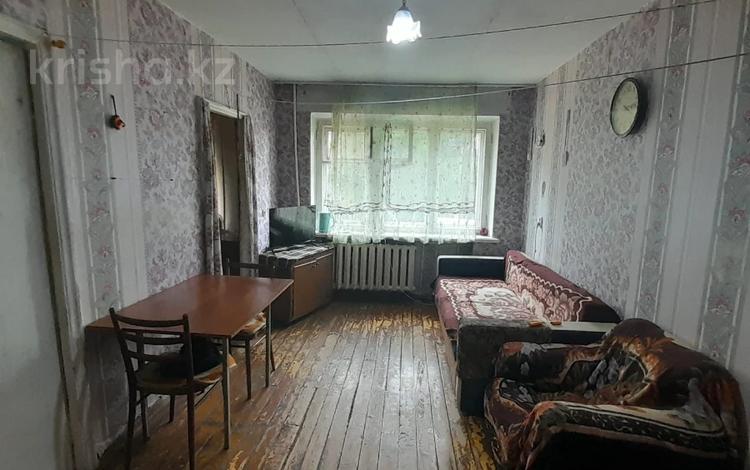 4-комнатная квартира · 60.7 м² · 2/5 этаж, Пришахтинск, 21й микрорайон 29 за 14 млн ₸ в Караганде, Алихана Бокейханова р-н — фото 2