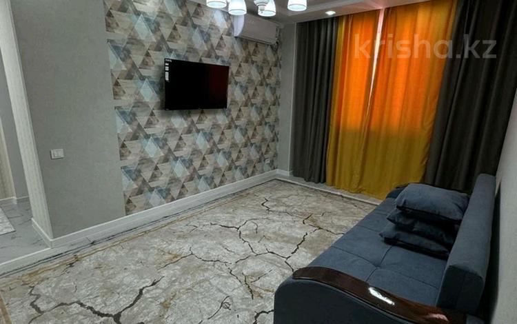 2-комнатная квартира · 63 м² · 11/12 этаж, мкр Кайтпас 1, Байдибек би за 200 000 ₸ в Шымкенте, Каратауский р-н — фото 2