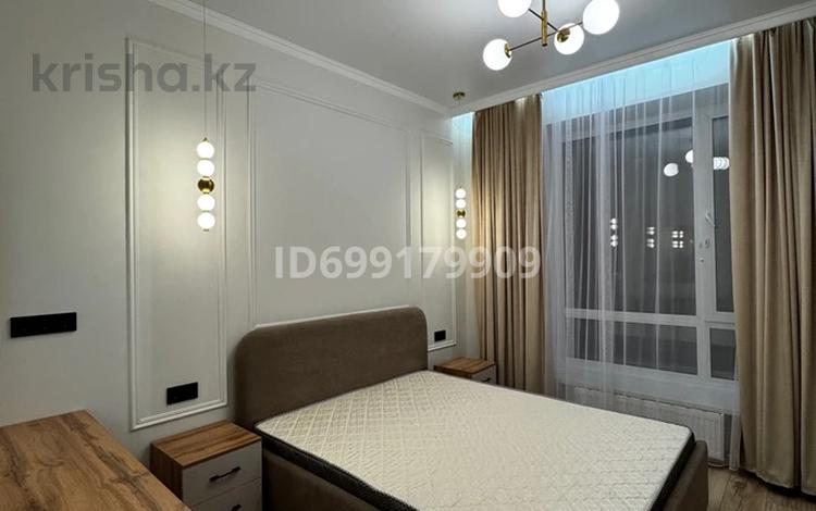 2-комнатная квартира · 40 м² · 4/12 этаж, Бухар-жырау 27 за 250 000 ₸ в Астане, Есильский р-н — фото 2