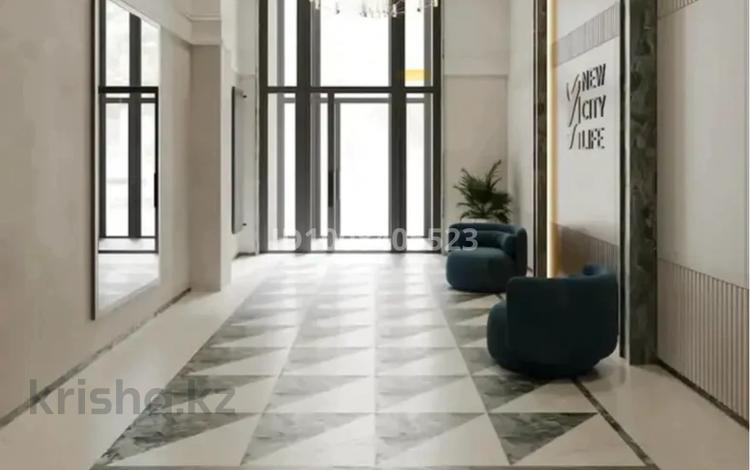 2-комнатная квартира · 64 м² · 12/18 этаж, Е 882 7 за 36 млн 〒 в Астане, Нура р-н — фото 2