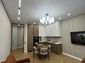 2-комнатная квартира · 50 м² · 7/18 этаж, Сыганак 28 за 49.3 млн ₸ в Астане, Нура р-н — фото 3