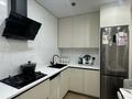 2-комнатная квартира · 70 м² · 4/10 этаж, мкр Нурсая, Т. Жумагалиева 10 за 35 млн ₸ в Атырау — фото 2
