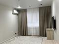 2-комнатная квартира · 70 м² · 4/10 этаж, мкр Нурсая, Т. Жумагалиева 10 за 35 млн ₸ в Атырау — фото 5