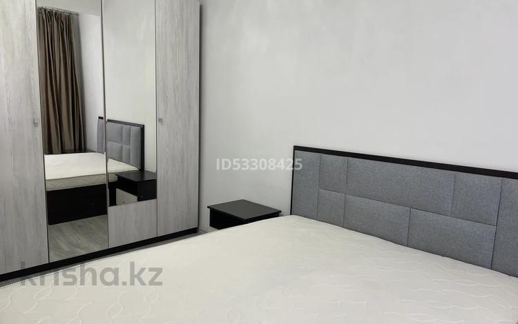 2-комнатная квартира · 55 м² · 8/10 этаж, Мкр Аксай, Б. Момышулы 25 за 290 000 ₸ в Алматы, Ауэзовский р-н — фото 18