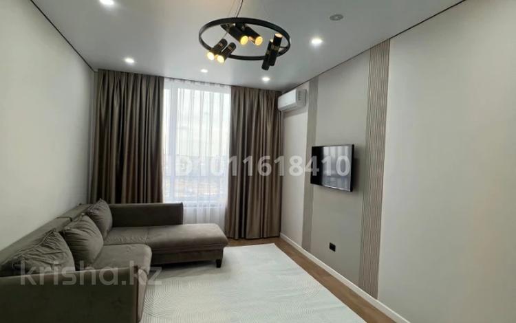 2-комнатная квартира · 47.63 м² · 11/12 этаж, мкр Ак Шагала, Акберен 4/1 за 330 000 ₸ в Атырау — фото 2