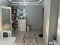 2-комнатная квартира · 52 м² · 9/10 этаж, мкр Аксай-5 за 37 млн ₸ в Алматы, Ауэзовский р-н — фото 7